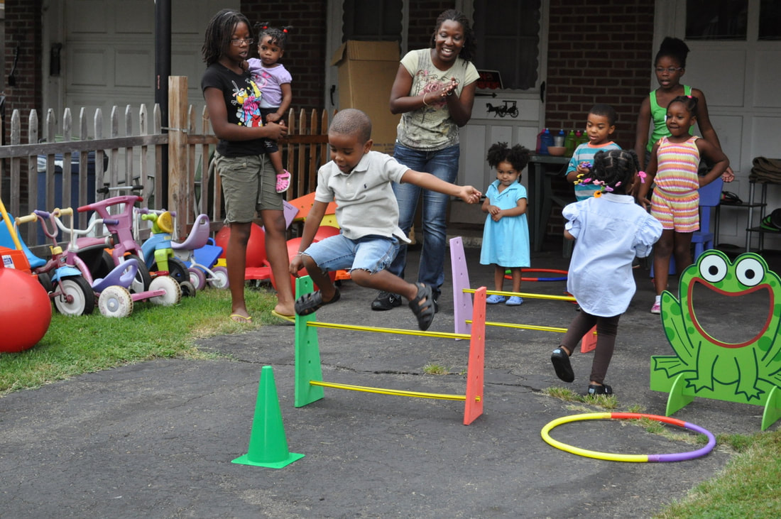 Image children doing an obstacle course